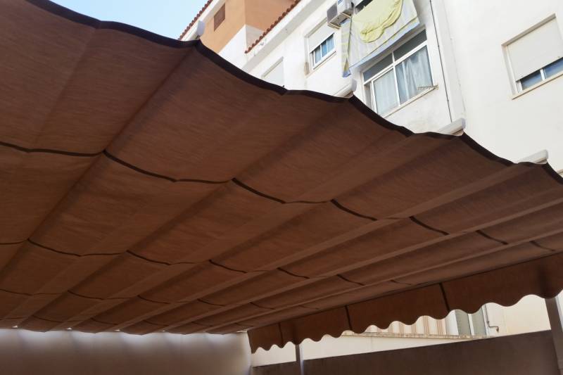 Toldo palillera en patio